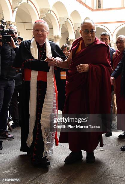 Milan Archibishop Angelo Scola welcomes Dalai Lama during a meeting with the Archbishop on October 20, 2016 in Milan, Italy. The Dalai Lama spiritual...