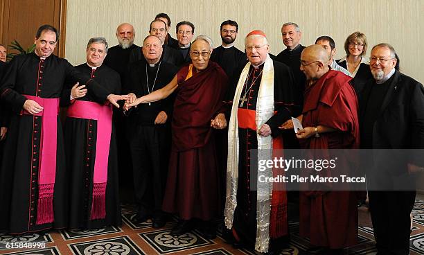 Dalai Lama, Milan Archibishop Angelo Scola and members of the delegation pose during a meeting with the Archbishop on October 20, 2016 in Milan,...