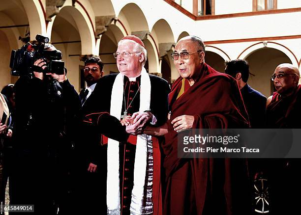 Milan Archibishop Angelo Scola welcomes Dalai Lama during a meeting with the Archbishop on October 20, 2016 in Milan, Italy. The Dalai Lama spiritual...