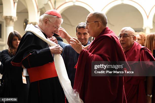 Milan Archibishop Angelo Scola welcomes Dalai Lama during a meeting with the Archbishop on October 20, 2016 in Milan, Italy. The Dalai Lama spiritual...