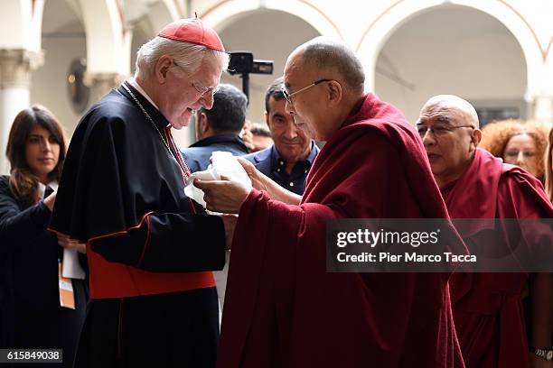 Milan Archibishop Angelo Scola welcomes Dalai Lama during a meeting with the Archbishop on October 20, 2016 in Milan, Italy. The Dalai Lama spiritual...