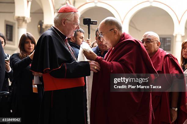 Milan Archibishop Angelo Scola welcomes Dalai Lama during a meeting with the Archbishop on October 20, 2016 in Milan, Italy. The Dalai Lama spiritual...