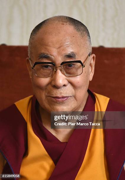 Dalai Lama during a meeting with the Milan Archibishop Angelo Scola on October 20, 2016 in Milan, Italy. The Dalai Lama spiritual leader of Tibetan...