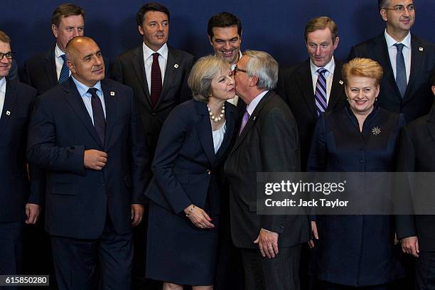 Bulgaria's Prime minister Boyko Borissov, British Prime Minister Theresa May kissing President of the European Commission Jean-Claude Juncker and...