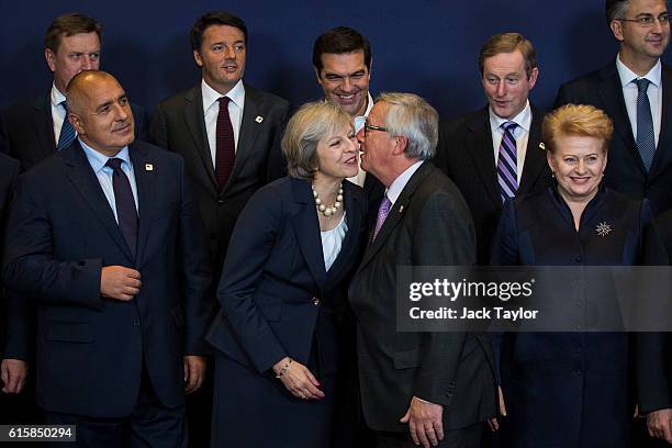 Bulgaria's Prime minister Boyko Borissov, British Prime Minister Theresa May kissing President of the European Commission Jean-Claude Juncker and...