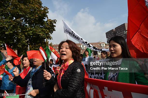 Demonstrators from the Chinese community in Milan protesting against the visit of the Dalai Lama and citizenship to onorem conferred by the City of...