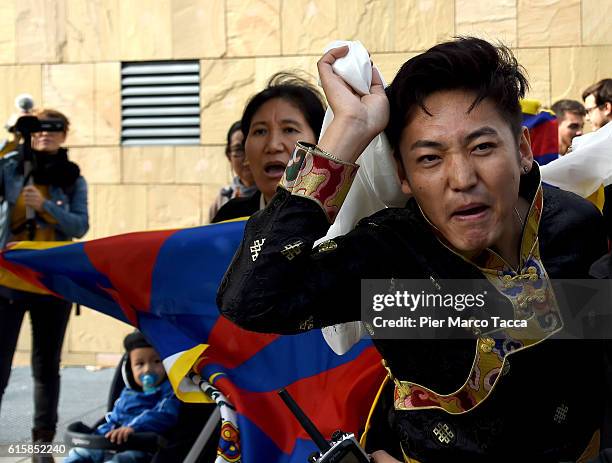 Demonstrators from the Tibetan community protest against the protesters of the Chinese community in Milan during the visit of Dalai Lama on October...