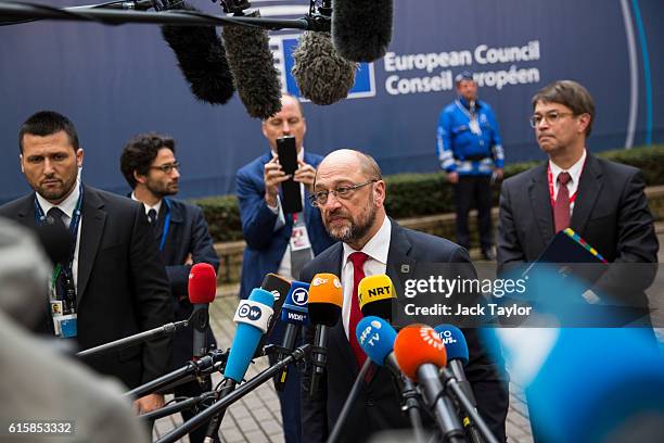 President of the European Parliament Martin Schulz addresses assembled media as he arrives at the Council of the European Union on the first day of a...