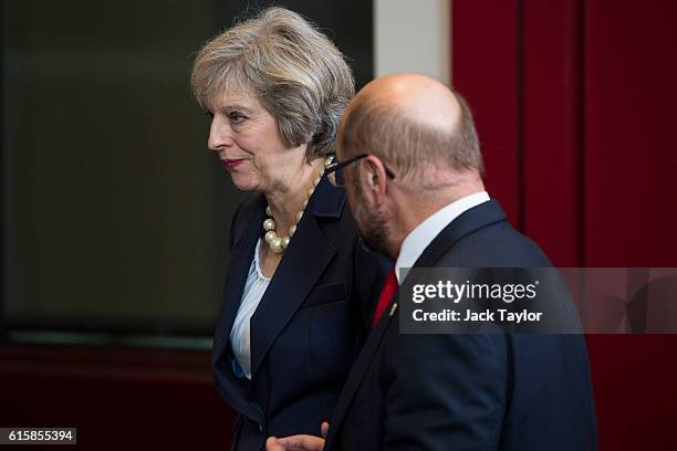 British Prime Minister Theresa May talks with President of the European Parliament Martin Schulz ahead of a group photo at the Council of the...