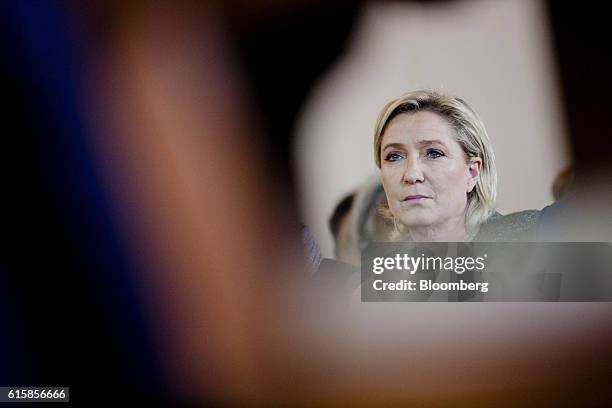 Marine Le Pen, leader of the French National Front, listens during a party debate in Paris, France, on Thursday, Oct. 20, 2016. Once seen as fringe...