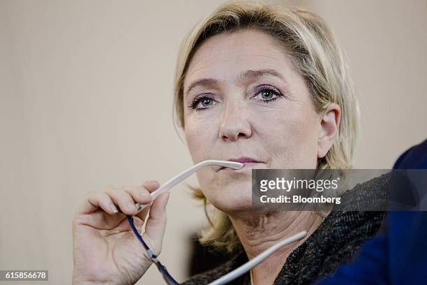 Marine Le Pen, leader of the French National Front, listens during a party debate in Paris, France, on Thursday, Oct. 20, 2016. Once seen as fringe...