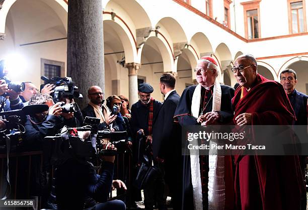 Milan Archibishop Angelo Scola welcomes Dalai Lama during a meeting with the archbishop on October 20, 2016 in Milan, Italy. The Dalai Lama spiritual...