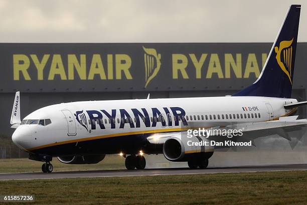 Ryanair plane lands at Stansted Airport on October 20, 2016 in London, England. Ryanair has reduced its profit forecast following the drop in the...