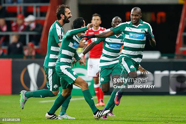 Panathinaikos' Colombian forward Victor Ibarbo celebrates with teammates after scoring a goal during the UEFA Europa League group G football match...