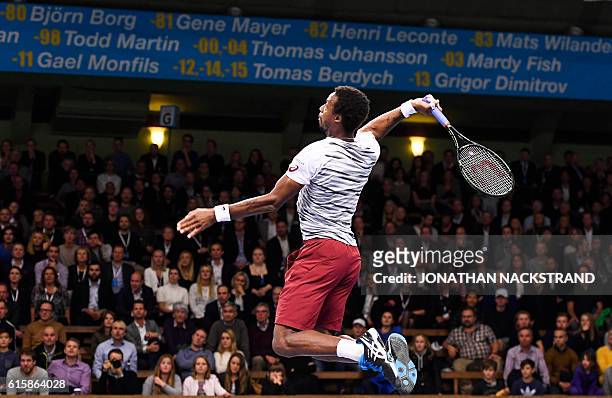 France's Gael Monfils returns the ball to Portugal's Gastao Elias during the ATP Stockholm Open tennis tournament in Stockholm on October 20, 2016. /...