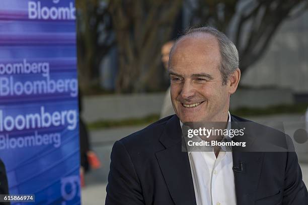 Michael Evans, co-president of Alibaba Group Holding Ltd., smiles during a Bloomberg Television interview at the Vanity Fair New Establishment Summit...