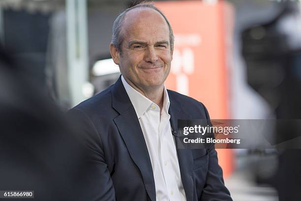 Michael Evans, co-president of Alibaba Group Holding Ltd., smiles during a Bloomberg Television interview at the Vanity Fair New Establishment Summit...