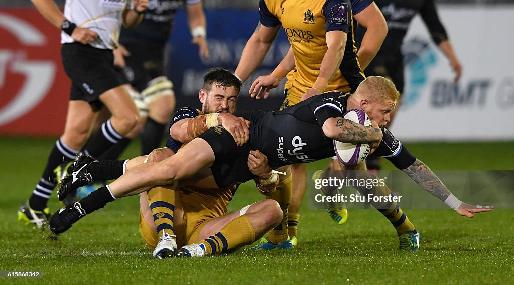 Tom Rugby Bath Bath player Tom Homer is tackled by Jonathan Fisher of Bristol during ...