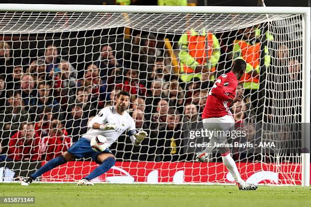 Paul Pogba of Manchester United scores the first goal from a penalty to make the score 1-0 during the UEFA Europa League match between Manchester...