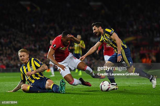 Anthony Martial of Manchester United wins a penalty as he is brought down by Sener Ozbayrakli of Fenerbahce during the UEFA Europa League Group A...