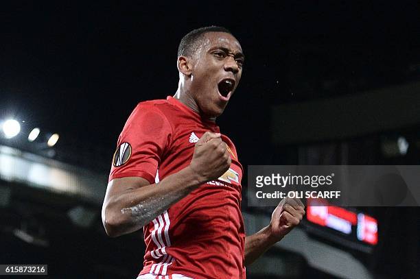 Manchester United's French striker Anthony Martial celebrates scoring their second goal from the penalty spot during the UEFA Europa League group A...