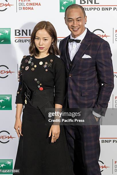 Peter Yun Tung Ho and Jiang Yiyan attend the photocall of movie 'Sword Master 3D ' during the 11th International Rome Film Festival in Rome, Italy....