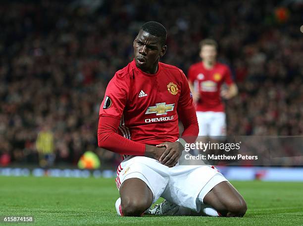 Paul Pogba of Manchester United celebrates scoring their third goal during the UEFA Europa League match between Manchester United FC and Fenerbahce...