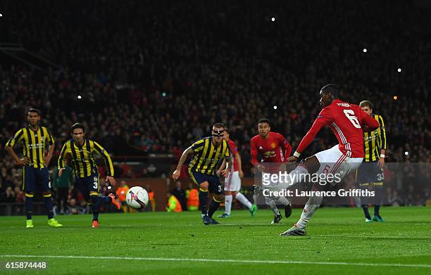 Paul Pogba of Manchester United scores the opening goal from the penalty spot during the UEFA Europa League Group A match between Manchester United...