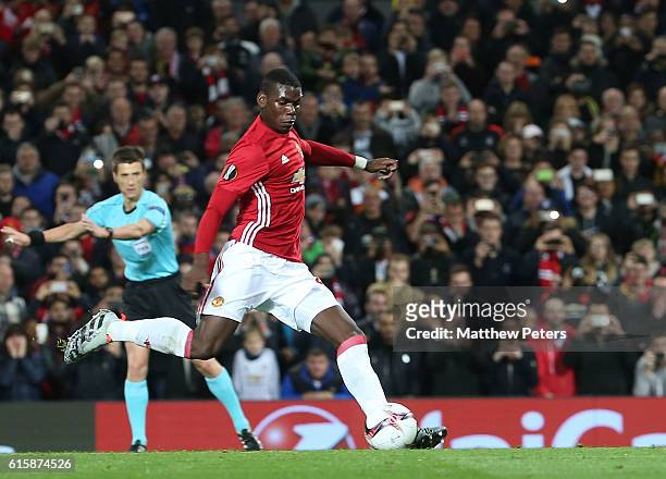 Paul Pogba of Manchester United scores their first goal during the UEFA Europa League match between Manchester United FC and Fenerbahce SK at Old...