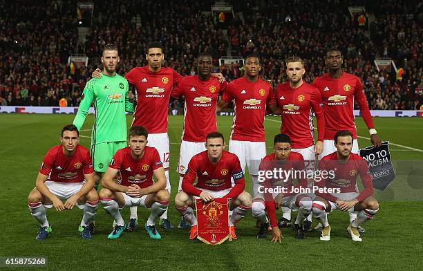 The Manchester United team lines up ahead of the UEFA Europa League match between Manchester United FC and Fenerbahce SK at Old Trafford on October...