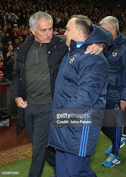 Manager Jose Mourinho of Manchester United greets Manager Dick Advocaat of Fenerbahce ahead of the UEFA Europa League match between Manchester United...