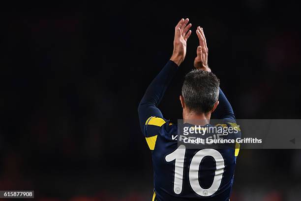 Robin van Persie of Fenerbahce applauds the fans following the final whistle during the UEFA Europa League Group A match between Manchester United FC...