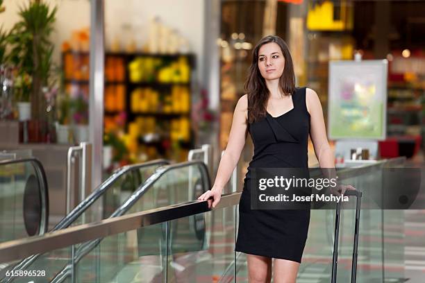 young woman is waiting for somebody - josef mohyla stock pictures, royalty-free photos & images