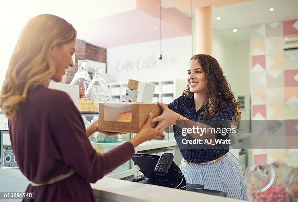 another day, another happy customer - bakery shop stock pictures, royalty-free photos & images