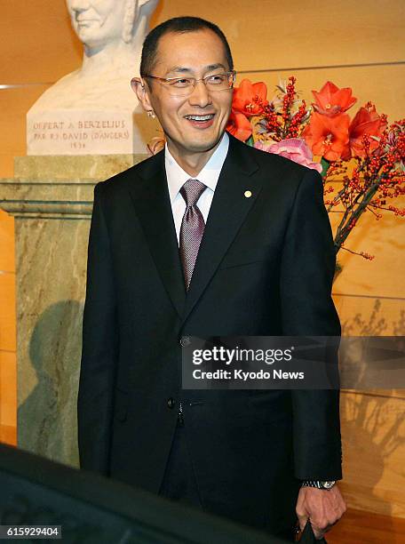 Sweden - Japanese medical researcher Shinya Yamanaka smiles before delivering a Nobel lecture at the Karolinska Institute in Stockholm, Sweden, on...