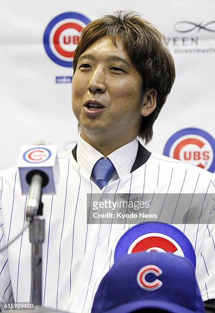 United States - Japanese right-hander Kyuji Fujikawa attends a press conference in Chicago on Dec. 7 after signing a two-year deal with the Chicago...