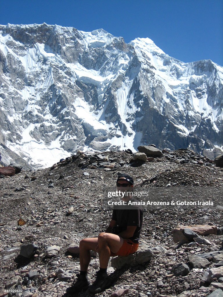 Trekker in Baltoro Glacier. Karakorum range, Pakistan.
