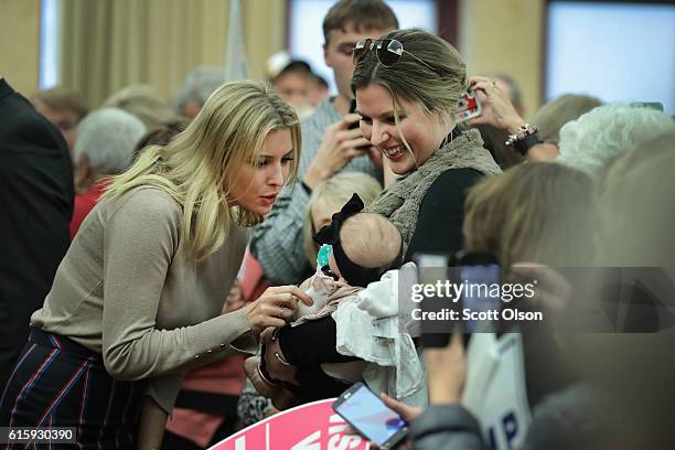 Ivanka Trump , the daughter of Republican presidential candidate Donald Trump, greets guests while making a campaign stop for her father on October...