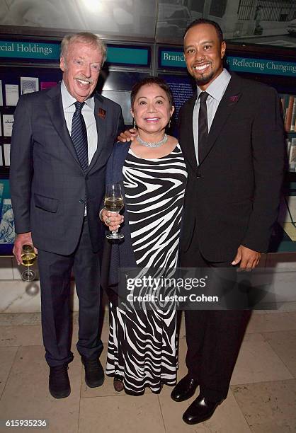 Phil Knight, Kultida Woods and Tiger Woods attend Tiger Woods