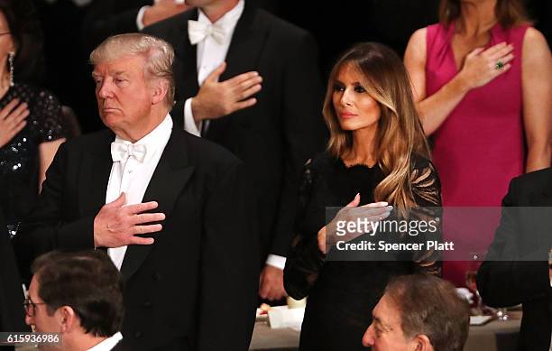 Donald Trump and his wife Melania Trump attend the annual Alfred E. Smith Memorial Foundation Dinner at the Waldorf Astoria on October 20, 2016 in...