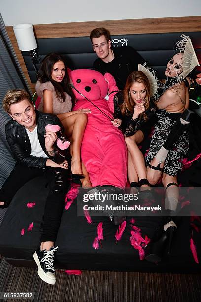 Jack Maynard, Guest, Oli White, Taryn Southern and guest attend the Moxy Berlin Hotel Opening Party on October 20, 2016 in Berlin, Germany.