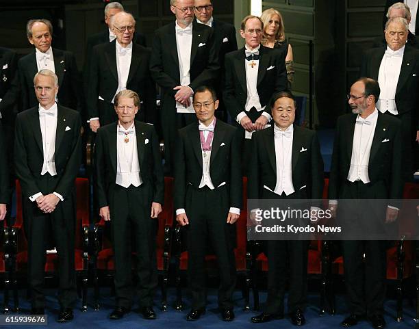 Sweden - The 2012 Nobel prize winners line up during the Nobel Prize award ceremony at the Stockholm Concert Hall in Stockholm on Dec. 10, 2012.