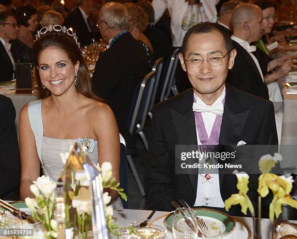 Sweden - Japanese stem cell researcher Shinya Yamanaka , a co-recipient of the 2012 Nobel Prize in medicine, is seated next to Sweden's Princess...