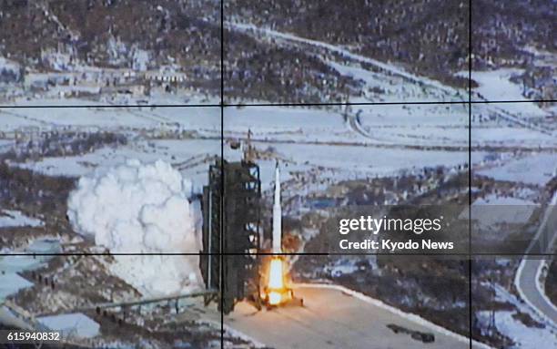 Tongchang-ri, North Korea - Photo of an image on the screen of North Korea's satellite control center shows a rocket being launched from the Sohae...