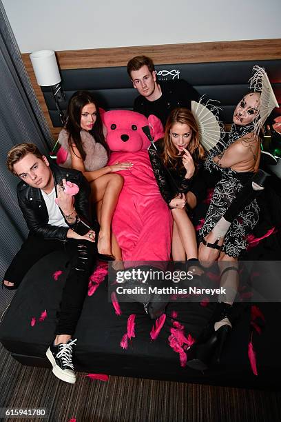 Jack Maynard, Guest, Oli White, Taryn Southern and guest attend the Moxy Berlin Hotel Opening Party on October 20, 2016 in Berlin, Germany.