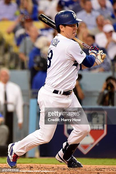 Kenta Maeda of the Los Angeles Dodgers hits in the third inning against the Chicago Cubs in game five of the National League Division Series at...