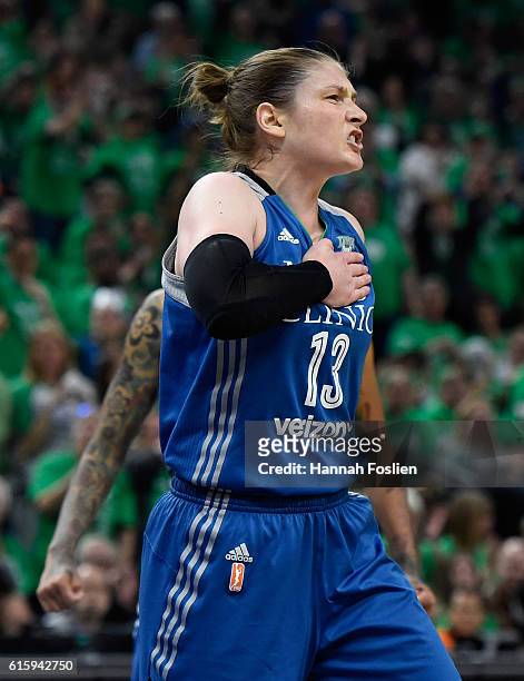 Lindsay Whalen of the Minnesota Lynx celebrates being fouled by Candace Parker of the Los Angeles Sparks during the first quarter in Game Five of the...