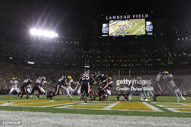 Quarterback Brian Hoyer of the Chicago Bears hands the ball off to defensive back Brandon Boykin of the Chicago Bears in the first quarter against...