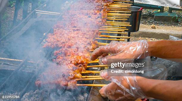 satays in manila - street food stock pictures, royalty-free photos & images
