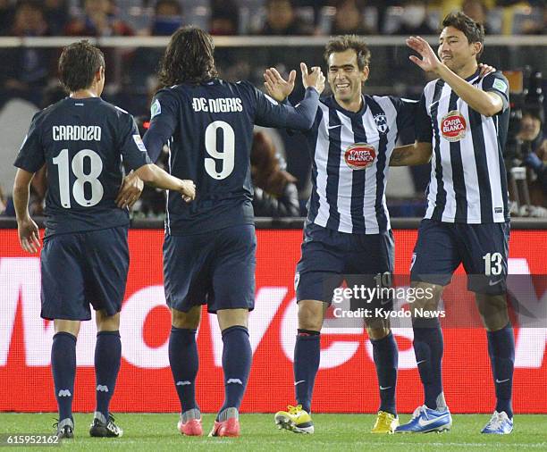 Japan - Cesar Delgado celebrates with his Monterrey teammates after scoring in the 66th minute of the third-place playoff at the Club World Cup...